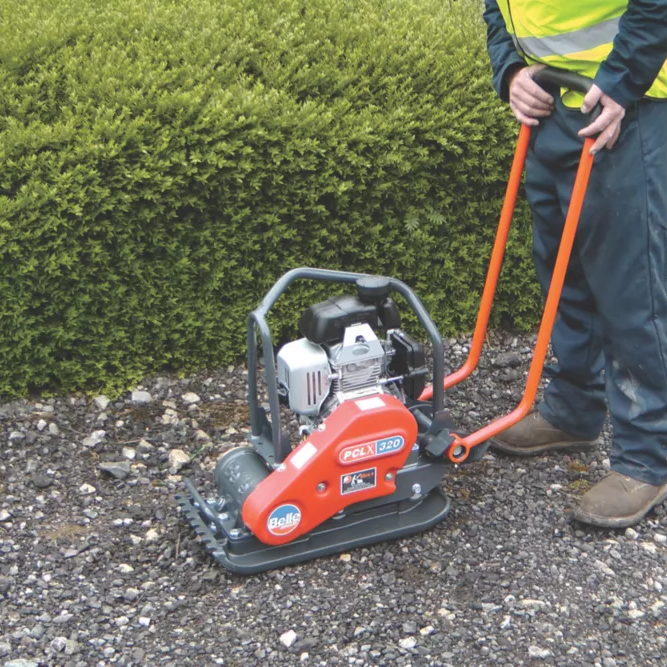 Worker using the Belle Vibrating Plate